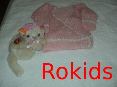 Casaquinho Rosa bebê e bordas branca